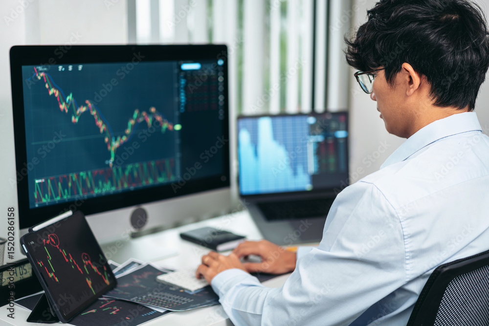 Poster businessman investor working with computer, tablet and analyzing graph stock market trading planning