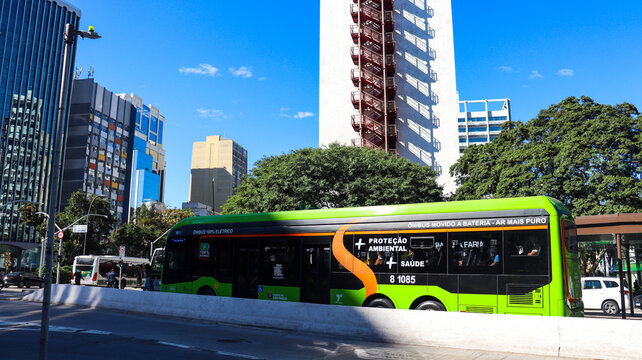 Electric bus in motion in S&atilde;o Paulo city with urban buildings in the background in S&atilde;o Paulo SP in 01 jun 25