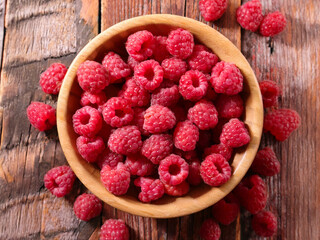 raspberries in a wooden bowl