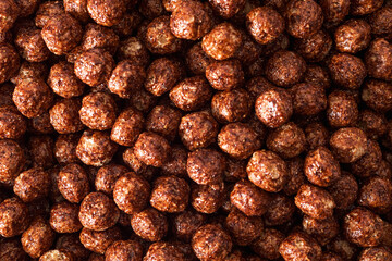 Full frame of crunchy chocolate cereal balls for breakfast or snack