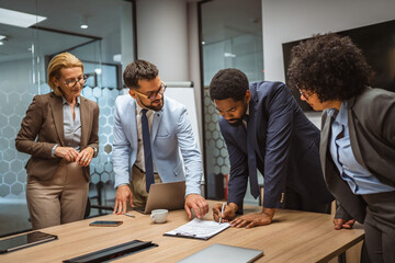 African american man agreement document signature on the meeting