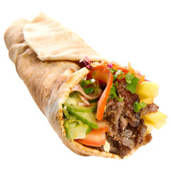 Delicious Mediterranean Shawarma Wrap with Fresh Vegetables. A mouthwatering shawarma wrap filled with seasoned grilled lamb, crisp vegetables (cucumbers, tomatoes, lettuce, red cabbage) © freelancerhamza65