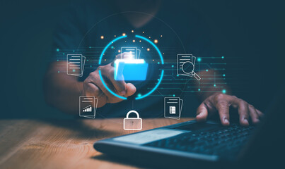 Document management system, Managing corporate files. Businessman using laptop computer for manage information, Online documentation database and process to efficiently manage files. Files protection.