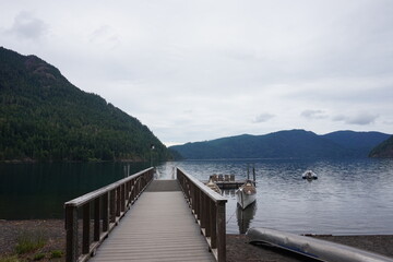 Fototapeta premium pier on the lake with boats