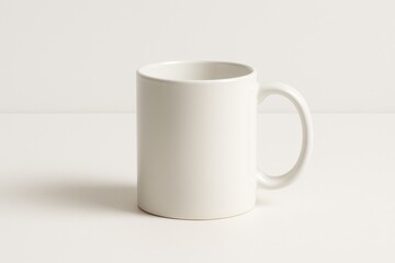 Fototapeta premium Plain White Ceramic Coffee Mug on White Background for Hot Beverages or Mockup Template