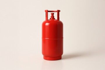 Obraz premium Red Propane Tank for Outdoor Grills and Heating Appliances on a Neutral Backdrop
