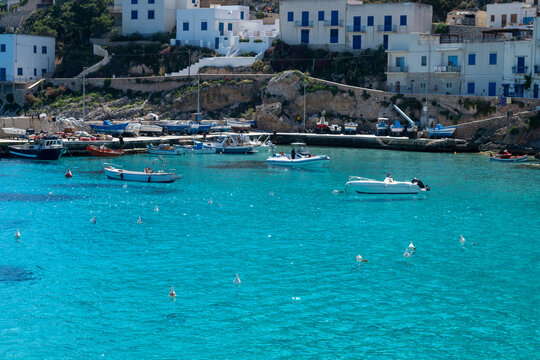Levanzo, smallest of Egadi Islands, tranquil retreat near Sicily, picturesque village around harbor, white houses and charming blue-water harbor, travel destination, boat trip