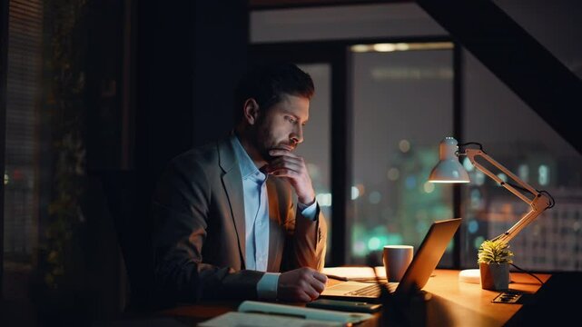 Late worker typing computer taking coffee flipping documents at office closeup