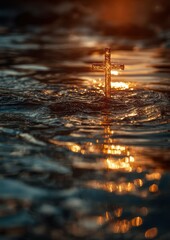 Golden cross reflects in rippling water at sunset, symbolizing faith and hope amidst life's challenges