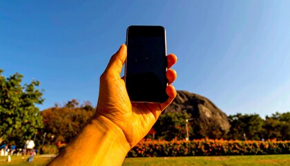 Life unfolds through the lens of his device.  