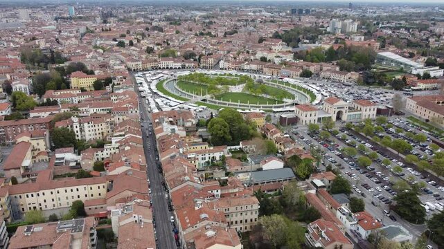Aerial view of Prato della Valle in Padova, showcasing one of Europe&rsquo;s largest squares with its iconic elliptical canal and statues.