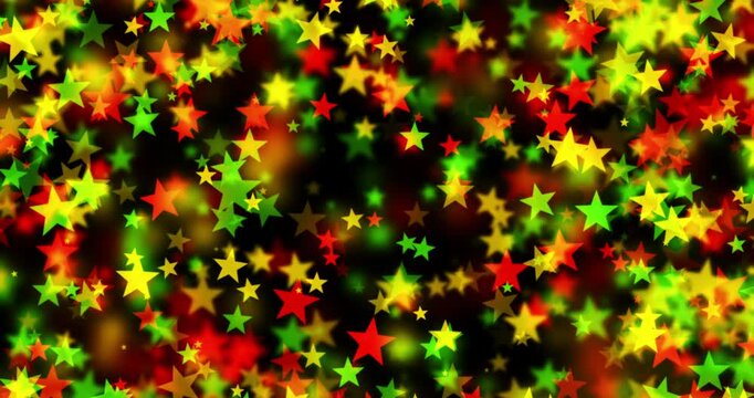 Stars floating outward in bold red, yellow, and green colors on black background for Juneteenth, or Freedom Day, to commemorate the ending of slavery on June 19th 1865 in the United States of America.