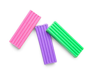 Colorful plasticine on white background