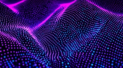 Abstract wave of glowing particles, vibrant purple and blue hues on black background.