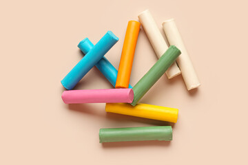 Fototapeta premium Colorful plasticine on beige background