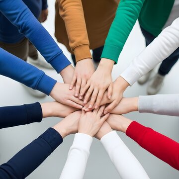 Collective commitment shown by diverse hands in unity huddle, teamwork for International Day for Countering Hate Speech, strong support