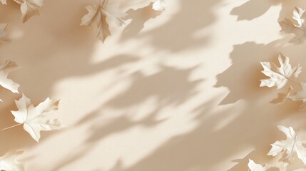 Beige background with scattered autumn leaves and their shadows.