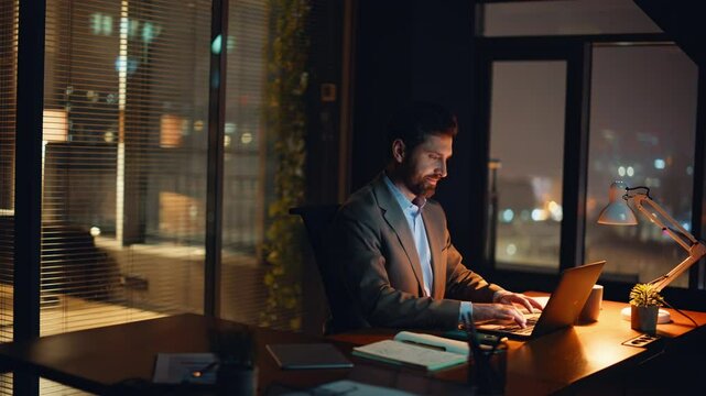 Focused professional organizing ideas during night shift inside quiet studio
