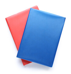 Different books on white background