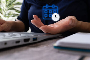 A person's hand extending from their laptop, with a calendar and clock icon on it, indicating planning an event, or a blurred scene in the background, representing rest and anticipation of time manage