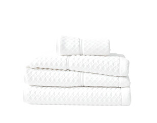 Neat stack of fluffy white bath towels.