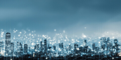 Fototapeta premium Illuminated cityscape showing interconnected network at dusk