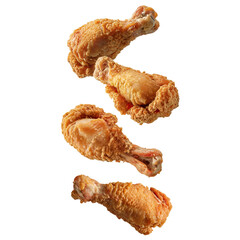 Falling fried chicken legs isolated on transparent white background