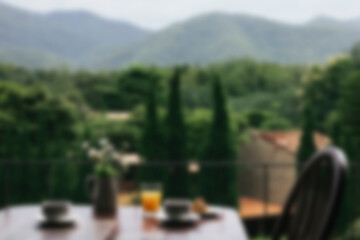 Breakfast on a wooden table with a natural view
