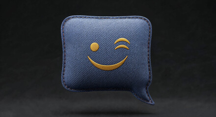 Winking golden emoticon smiling on blue jeans speech bubble
