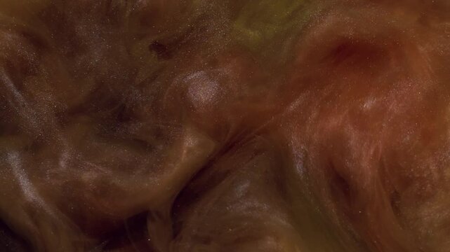 Blend drop. Flowing paint. Defocused yellow bronze smoke vapor water wet chemical splash liquid floating on abstract art background.