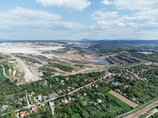 The abandoned, dead city near the Kolubara pit on coal mining by the open way. Drone view Lazarevac, Serbia.