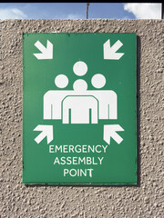 Emergency assembly point sign directs individuals to safe location in Penang, Malaysia