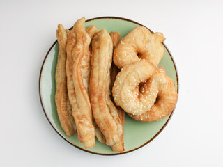 Fried donuts on green plate