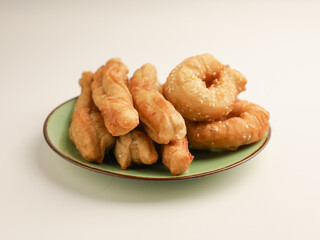 Fried donuts on green plate