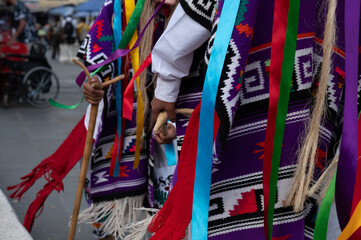 Vibrant costumes and masks in Danza de los Viejitos performance in Mexico
