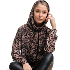 Trendy animal print hoodie worn by a model with a stylish pose indoors