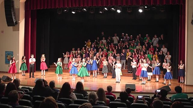 Young actors performing in a school musical theater play