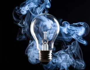 Illuminated light bulb surrounded by smoke