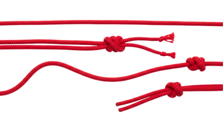 Close Up of Red Braided Ropes with Knots on a Black Background for Graphic Design