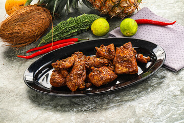 Indian cuisine - Vindaloo fish with spices