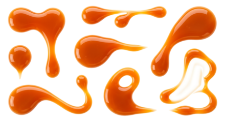 Delicious Caramel Sauce Splatters Isolated on a Black Background Perfect for Dessert Toppings and Sweet Treats Illustrations