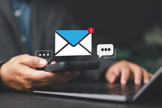 Businessman reading electronic mail, Email marketing and newsletter concept, Digital communication with email messages, Sending and receiving messages online with the email icon, notifications