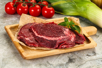 Raw beef cheeks cut for cooking