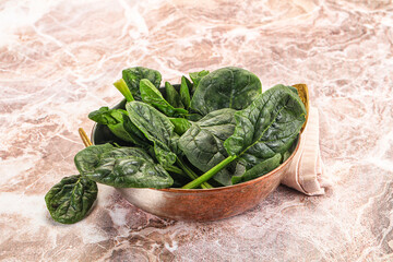 Fresh green spinach leaves heap