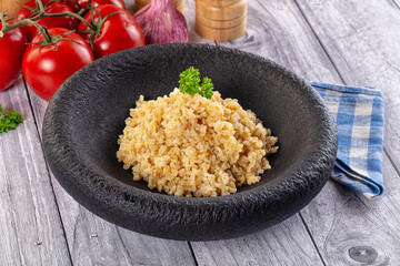 Vegan cuisine - boiled bulgur garnish