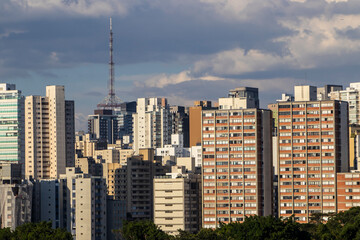 The exterior of modern condominiums is used full of glass, including sliding doors, windows and...