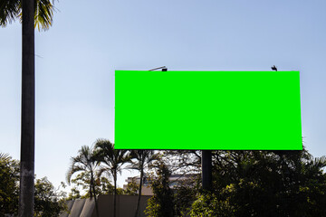 advertising sign with green background, spectacular billboard with chroma key in rural zone in Brazil