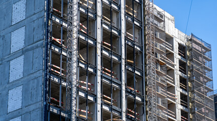 Construction site: unfinished residential apartment building in development process