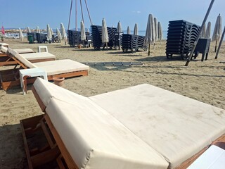 beach chairs and umbrellas