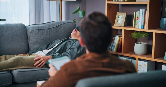 Man, breathing and consultation with psychologist for therapy or calm with tablet in office. Counselor, peace and help patient on sofa with eye mask for insomnia, sleep paralysis or mental health